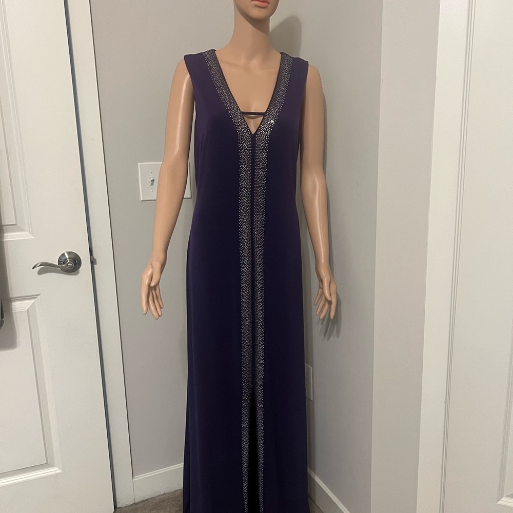 Elegant purple gown w/rhinestone appliqué.